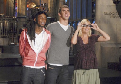 Musical guest Lil Wayne (l.), Michael Phelps (c.), Amy Poehler (r.)/Courtesy of NBC